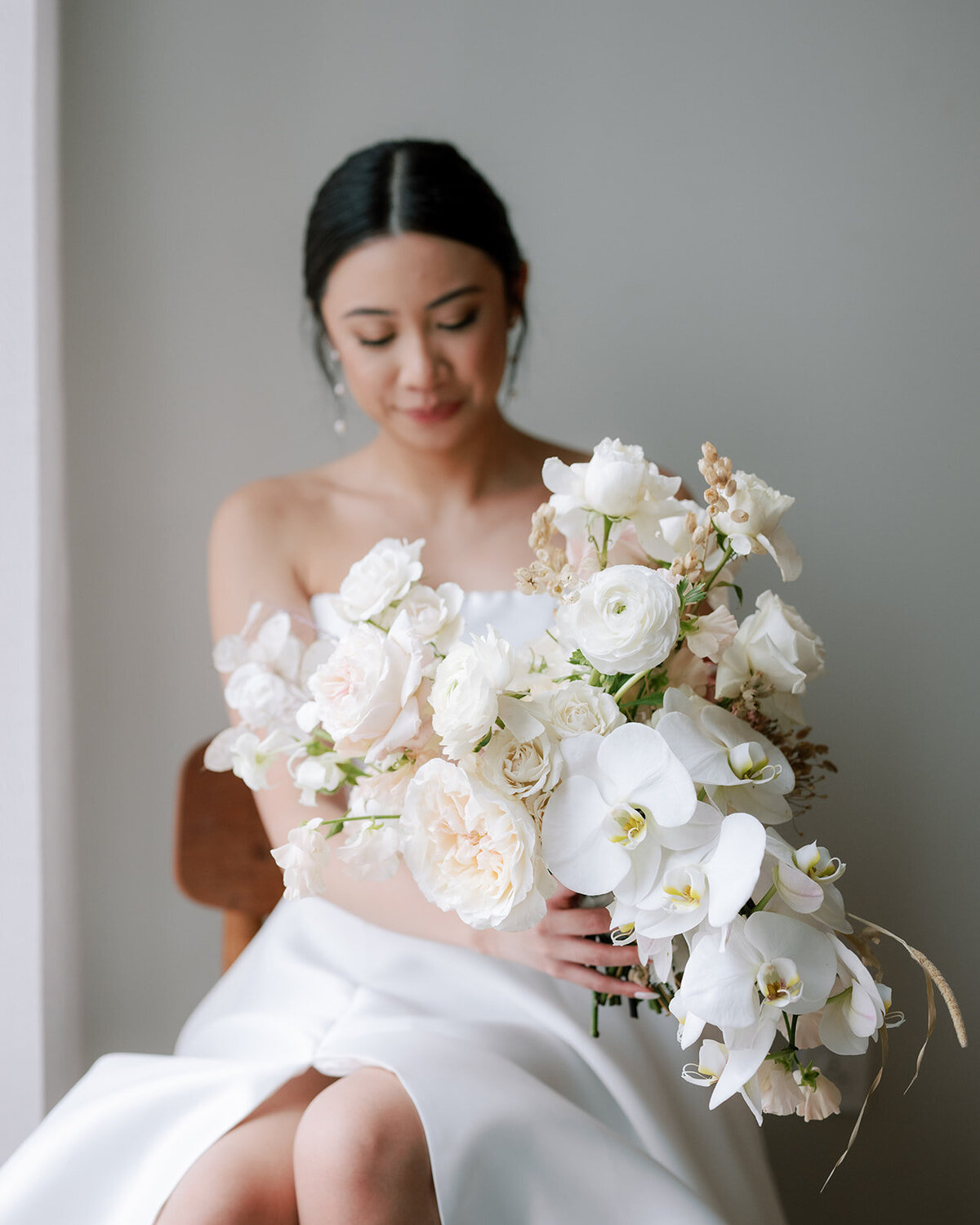 alll-white-bridal-bouquet-orchids