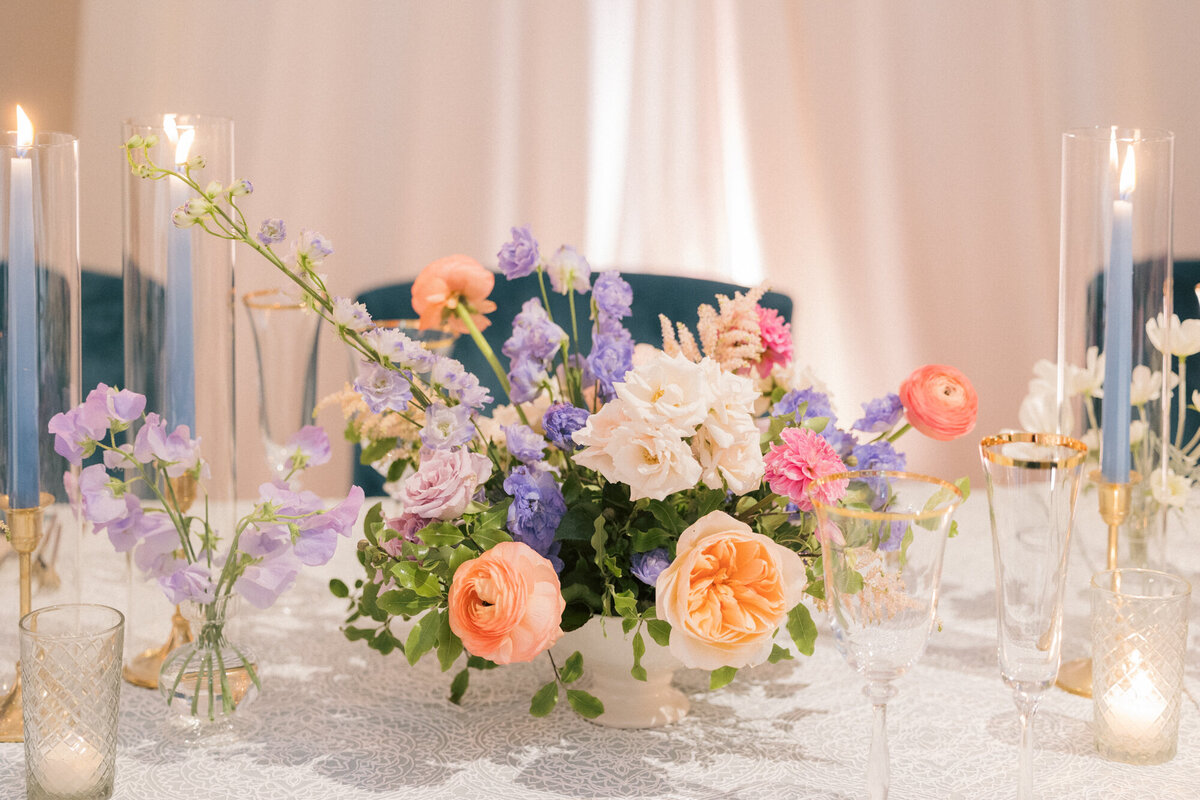 A colorful table setting at a wedding reception hosted at the Peninsula in Chicago