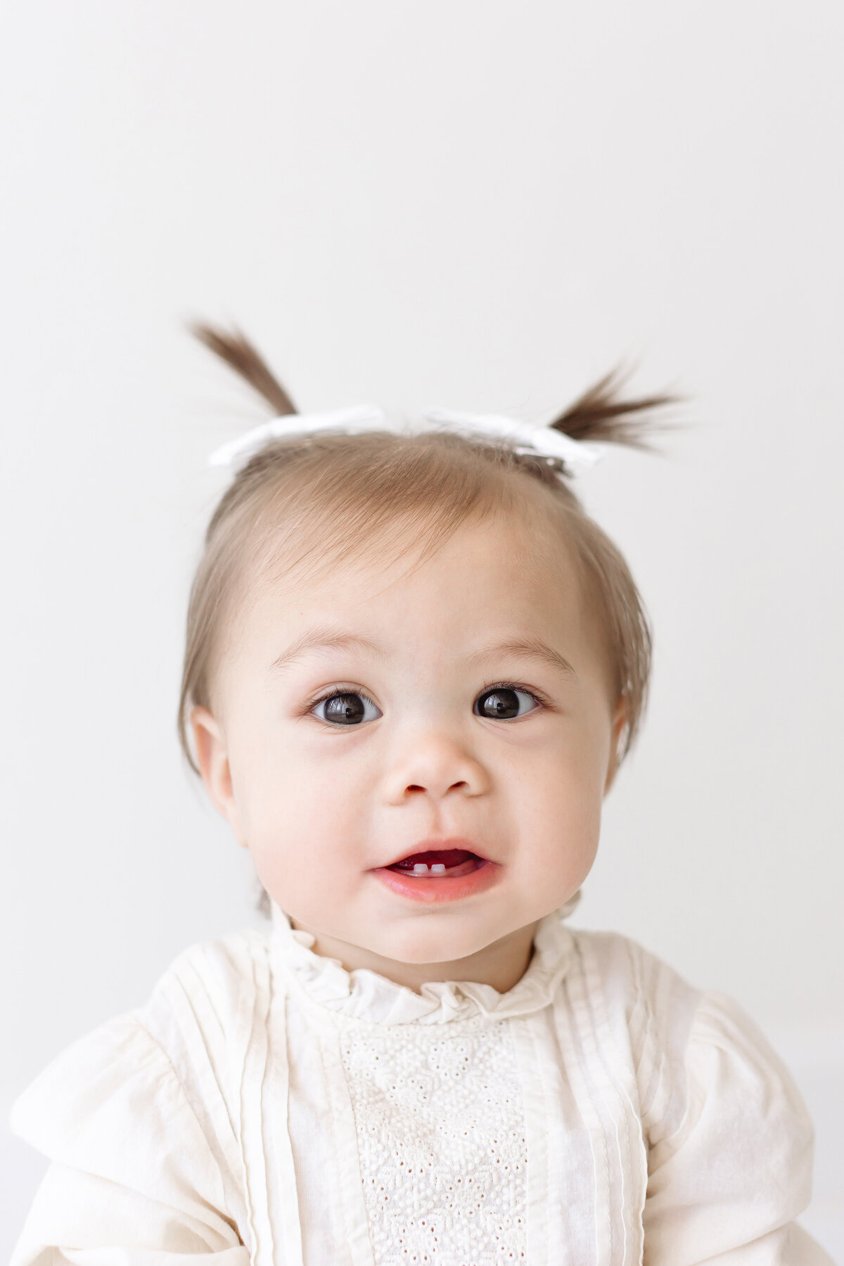 baby girl with pigtails
