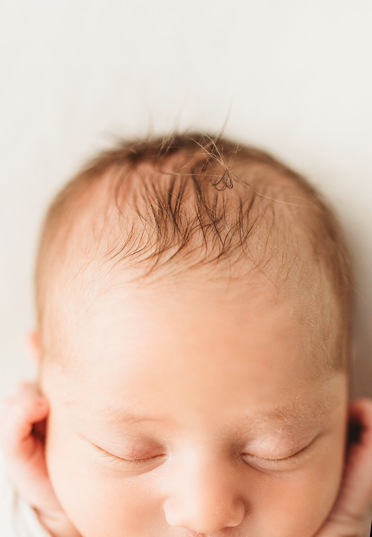 wispy hair and small details of a little newborn photography Perth session
