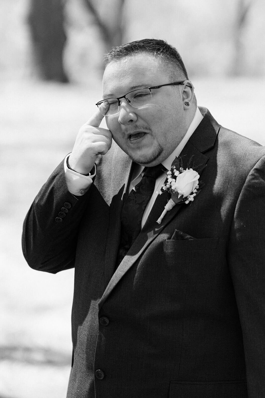 Man looking emotional before wedding at Rochester, NY