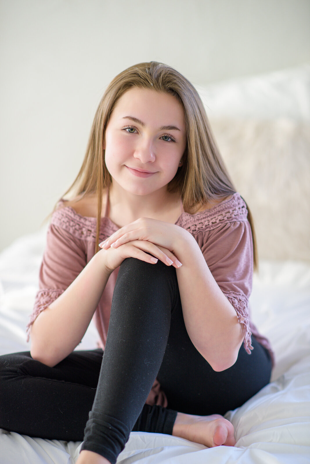 Tween girl sitting in photo studio in Boise.