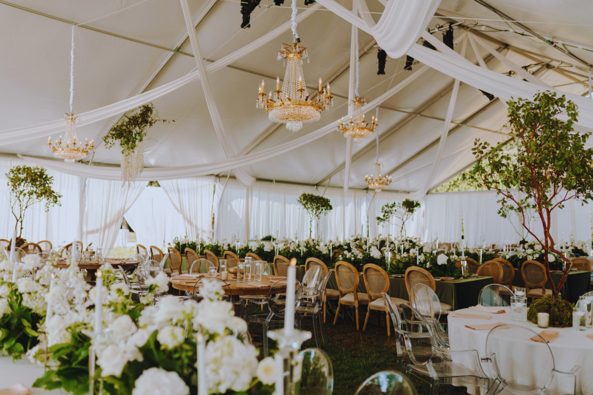 outdoor-garden-ceremony-tent-dining-decor-chandeliers-greenery