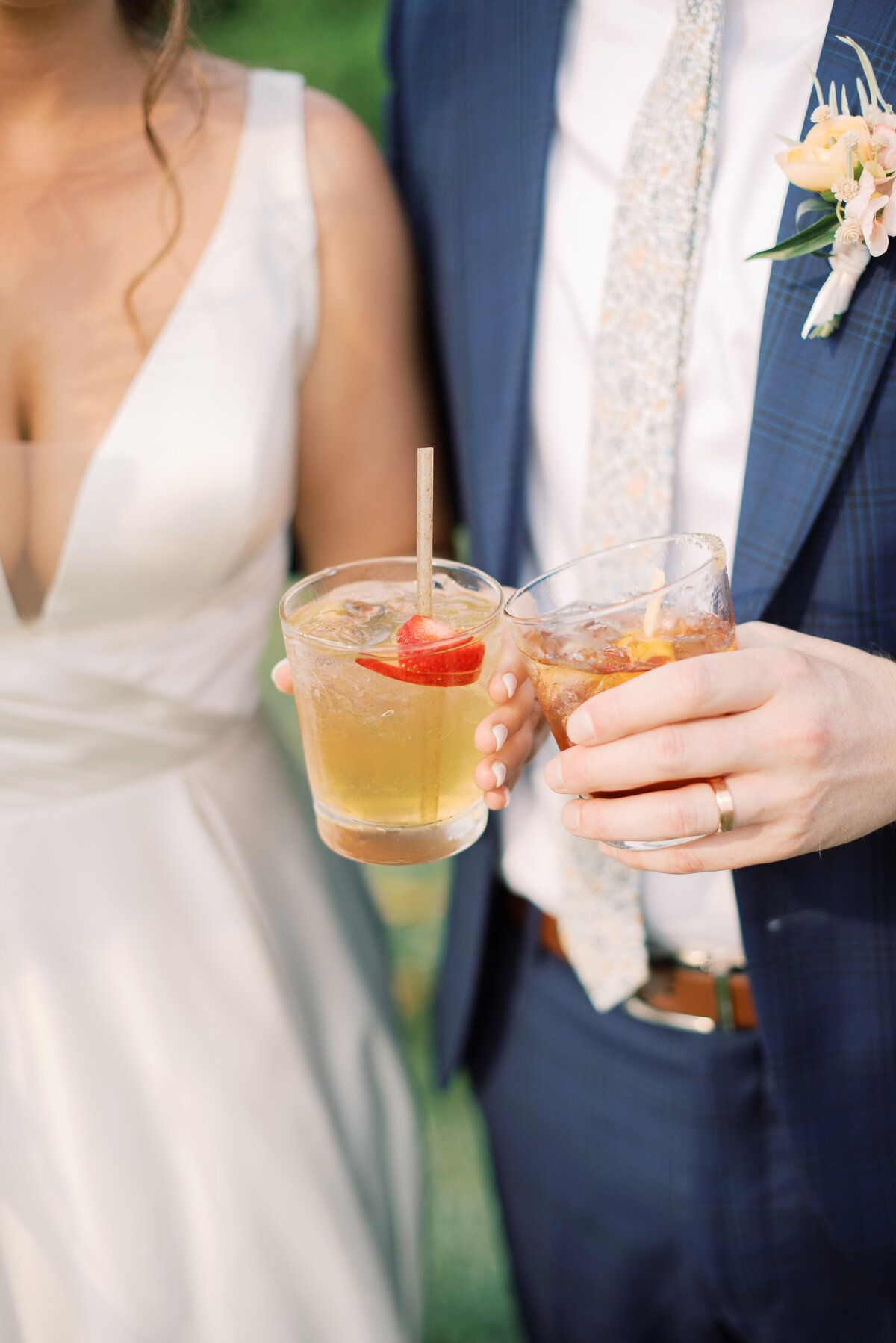 up close photo of couple holding a drink