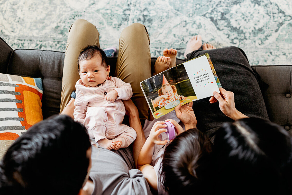 reading stories during Toronto Newborn session