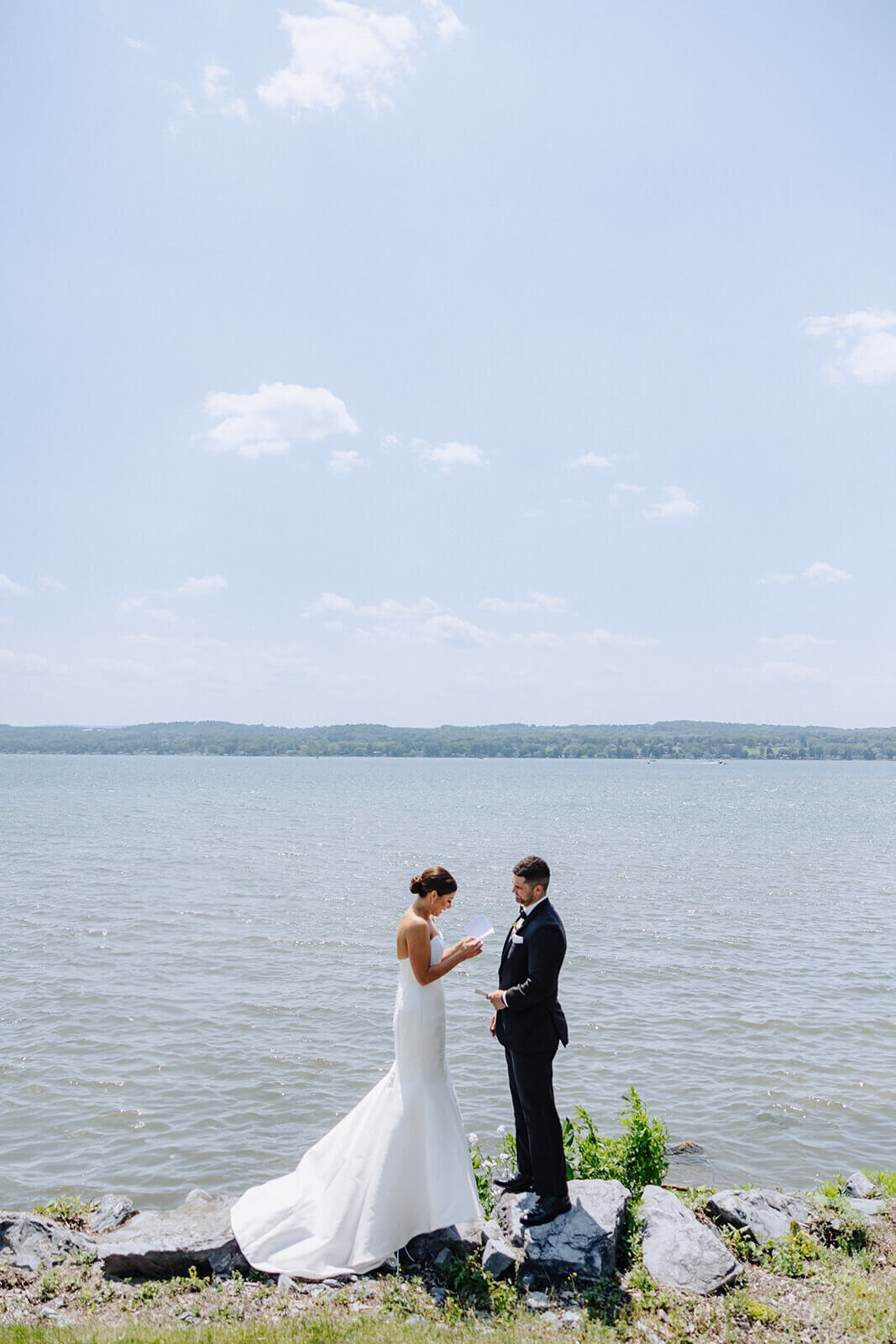 Bride reading vows to groom at Canandaigua Country Club wedding, NY