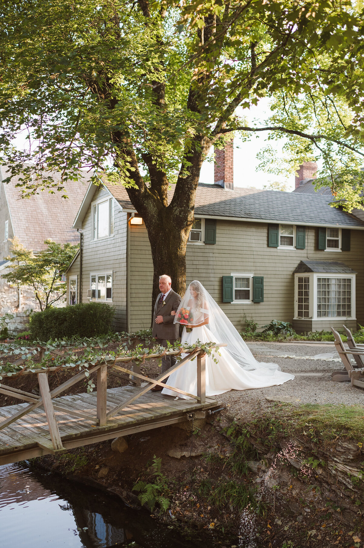 wedding ceremony at the inn at millrace pond
