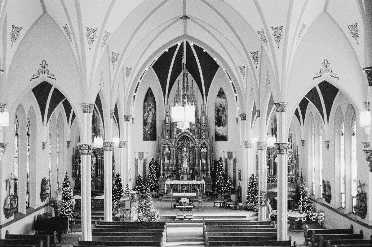 black and white photo of a beautiful church before a wedding ceremony.