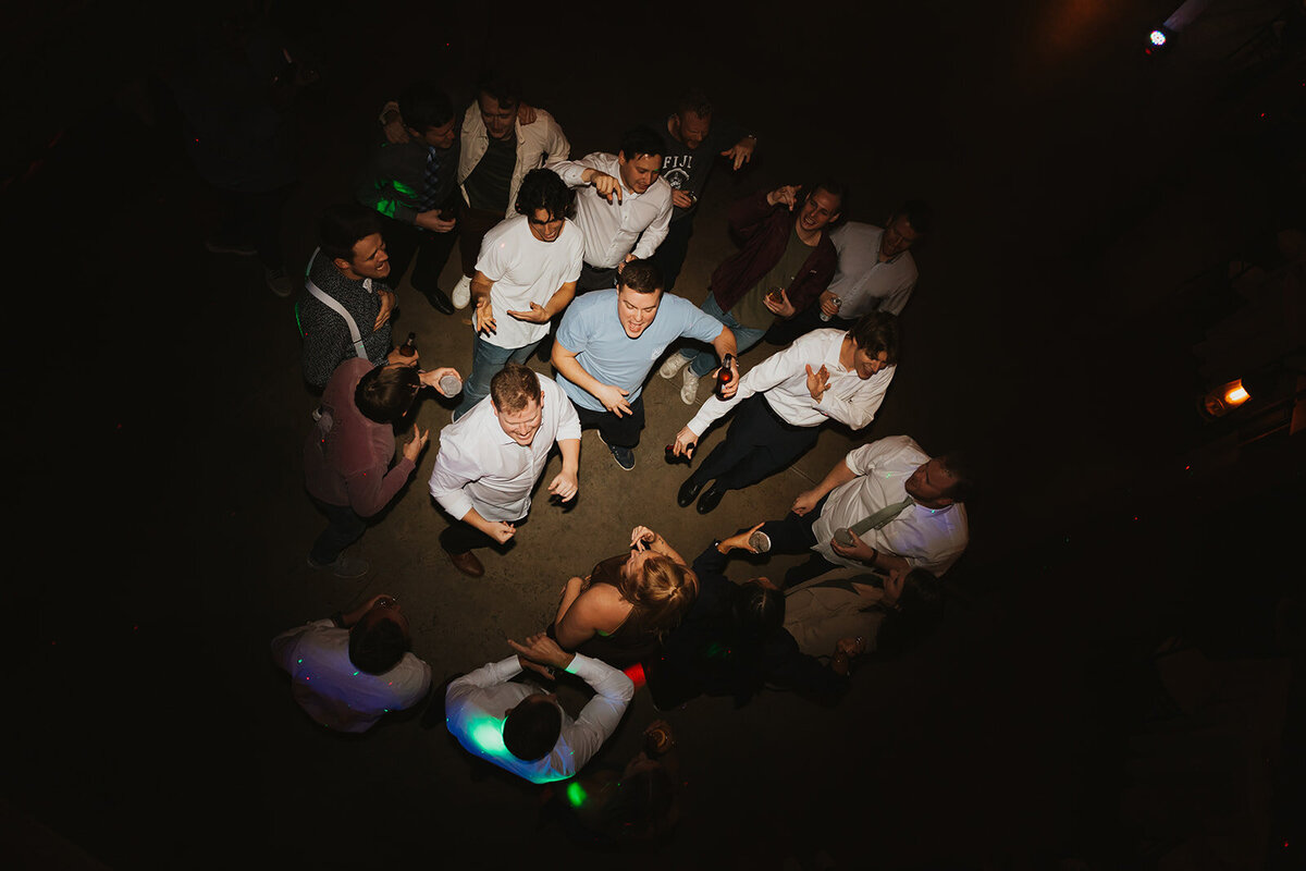 birds eye view of guests dancing at a wedding