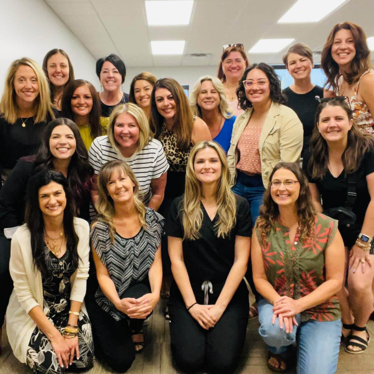 Group photo of women entrepreneurs and Cactus & Pine Photography owner