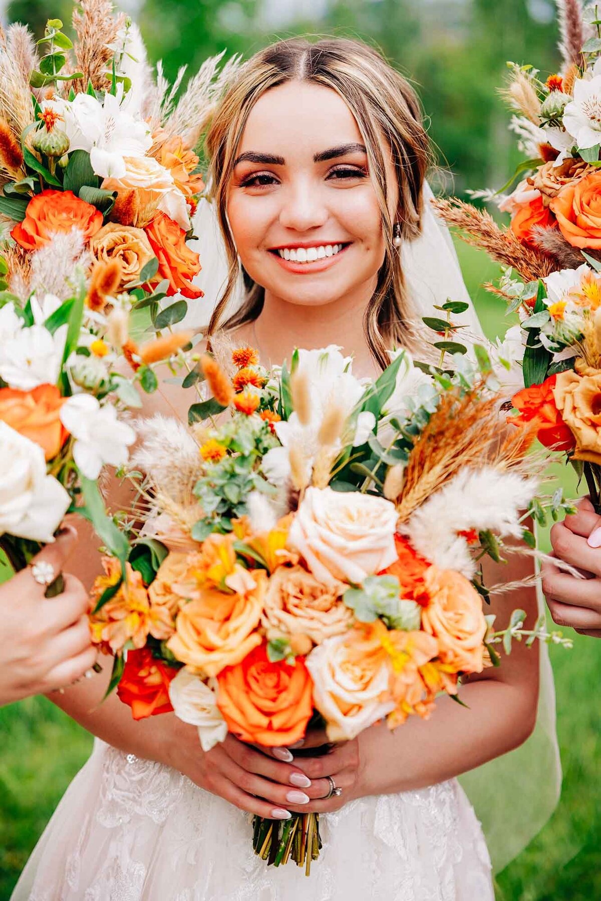 Bride surrounded by flower bouquets, Shades of Green Events, Helena, MT