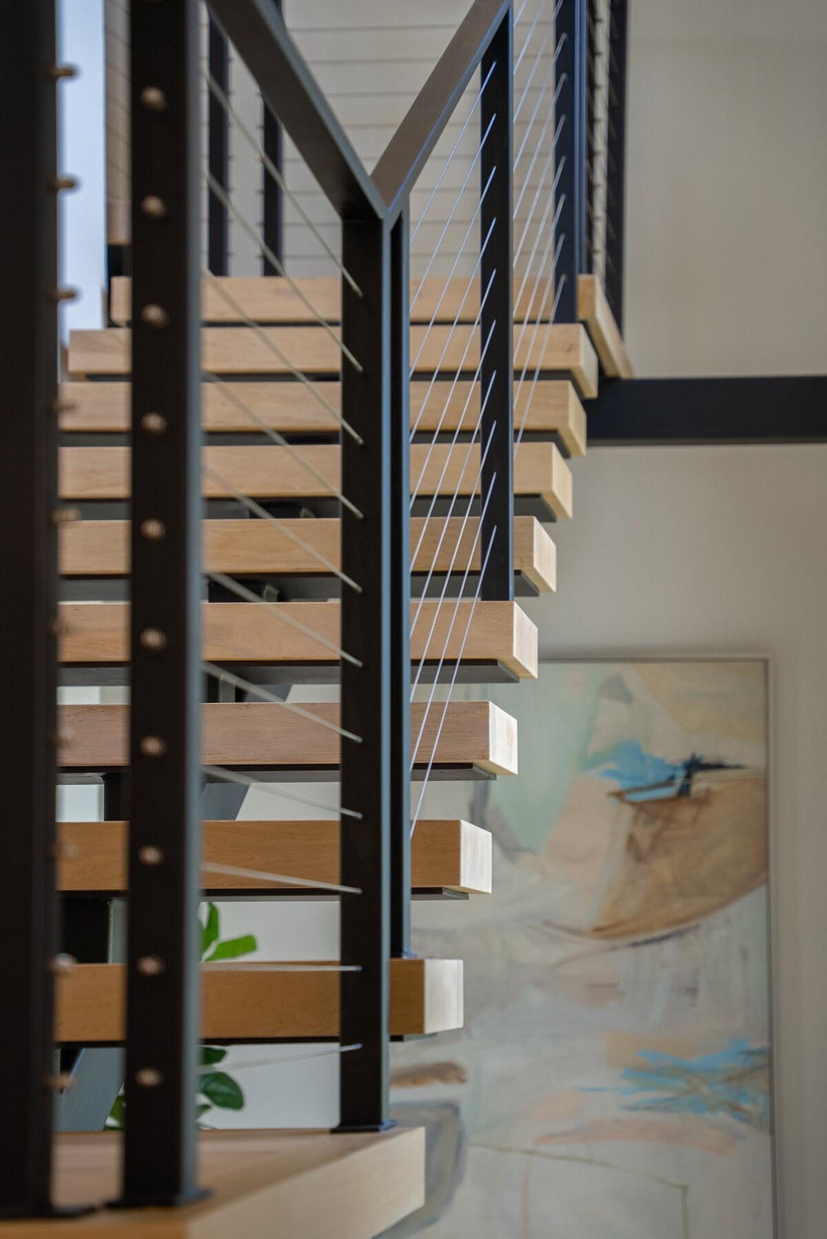 Modern staircase inside North Texas spec home