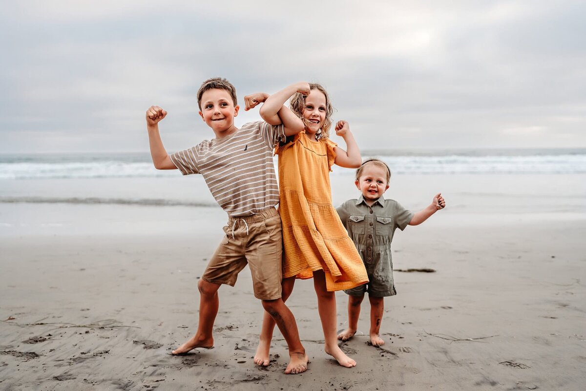 San Diego Family Photographer captures children dancing on beach