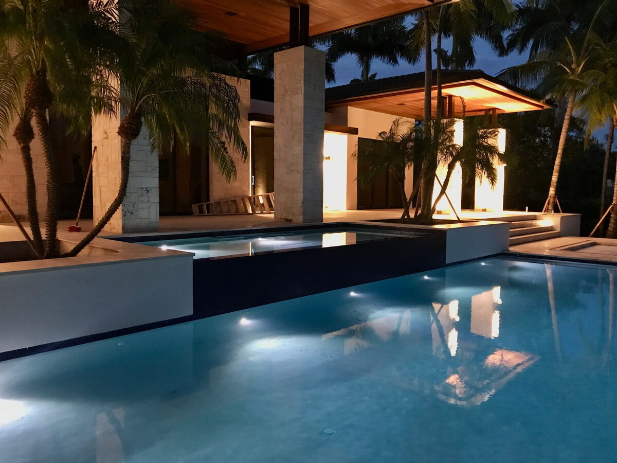 Swimming pool and spa at night
