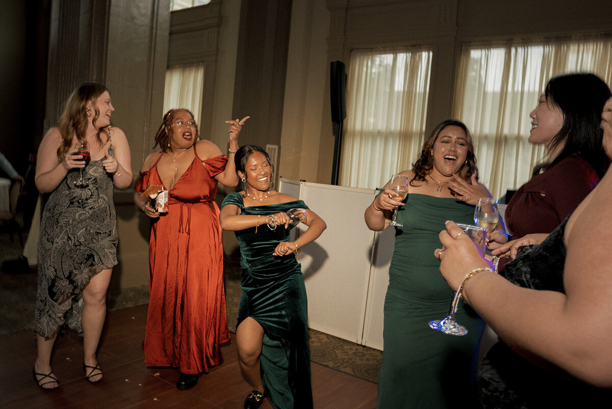 wedding guests dancing celebrating reception