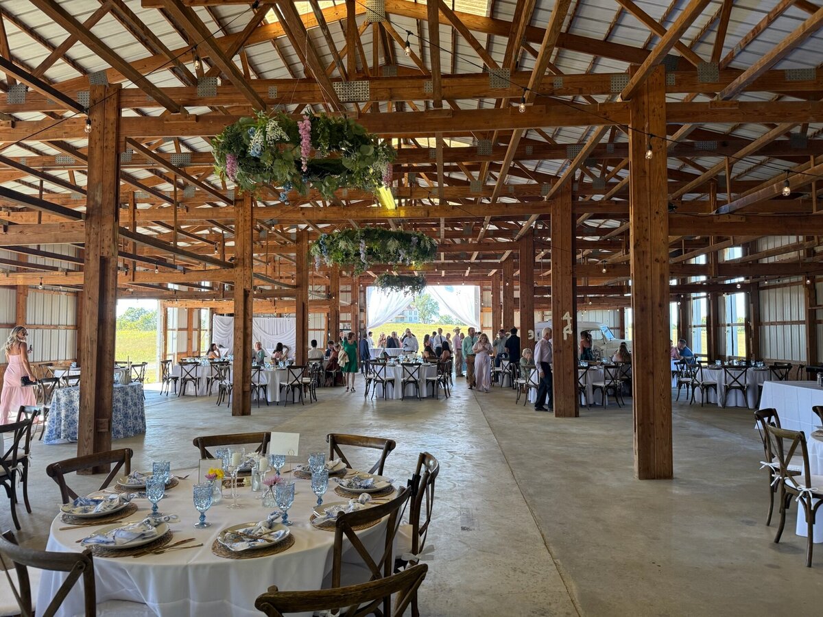 Indoor reception hall elegant barn with rustic themes at Willstone Acres wedding venue