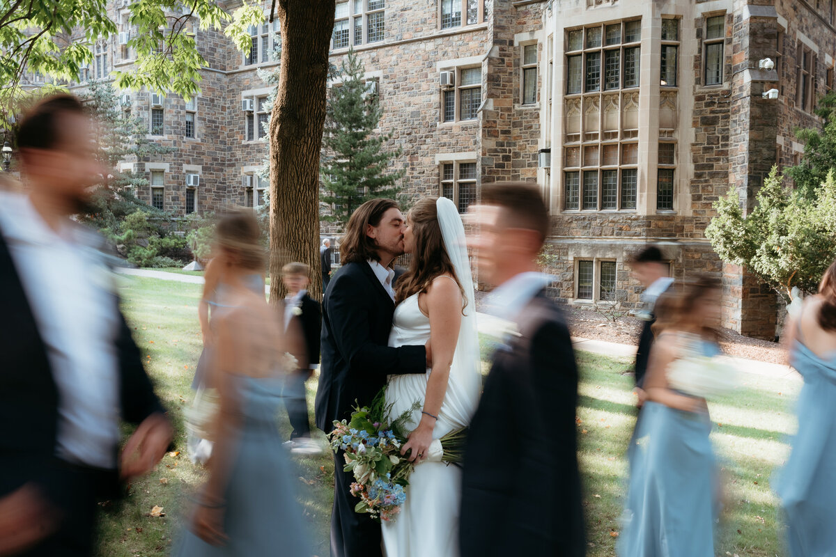 Candid wedding kiss with motion blur, highlighting authentic emotions in documentary wedding photography. A timeless moment captured in Bethlehem, Pennsylvania