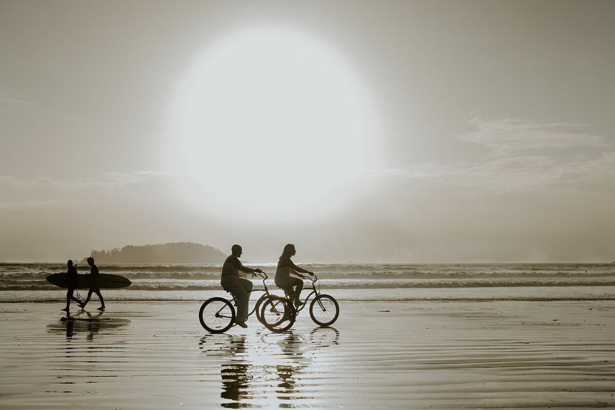 Brides riding bikes during their wedding