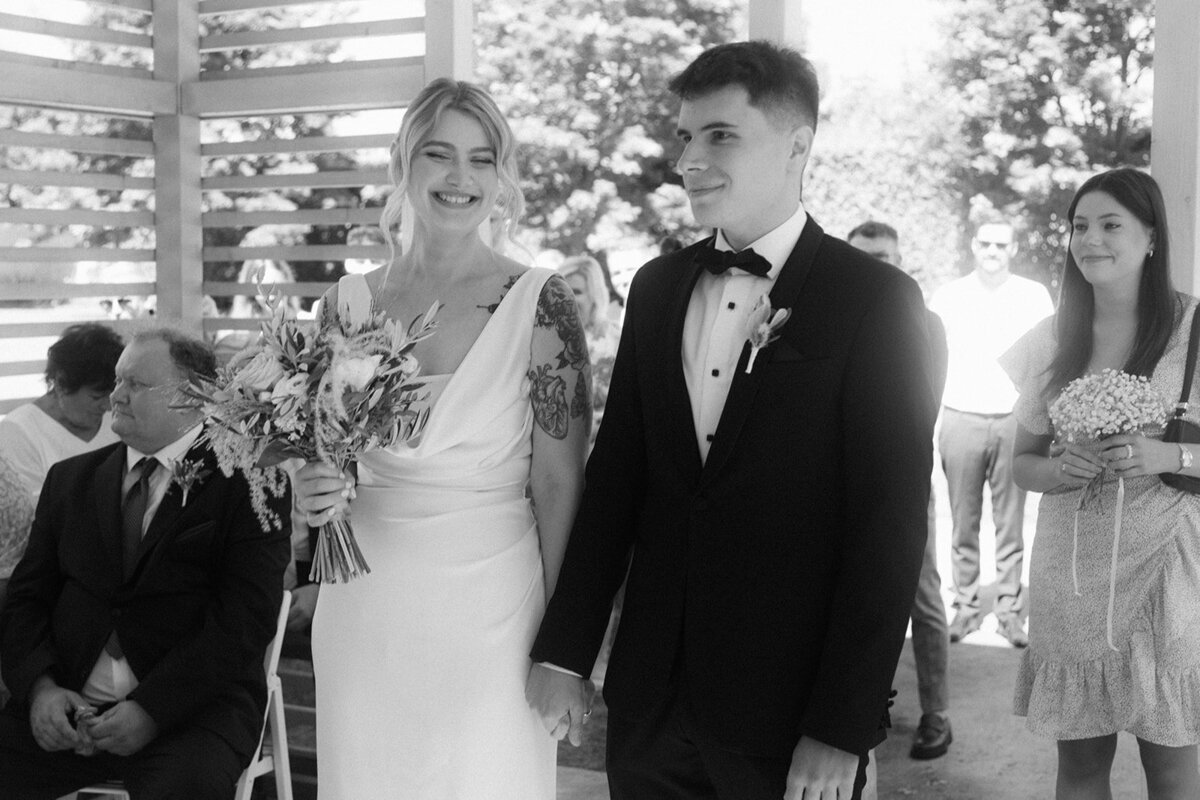Luxury wedding in Europe – sophisticated bride in a modern wedding gown and groom in a timeless suit.