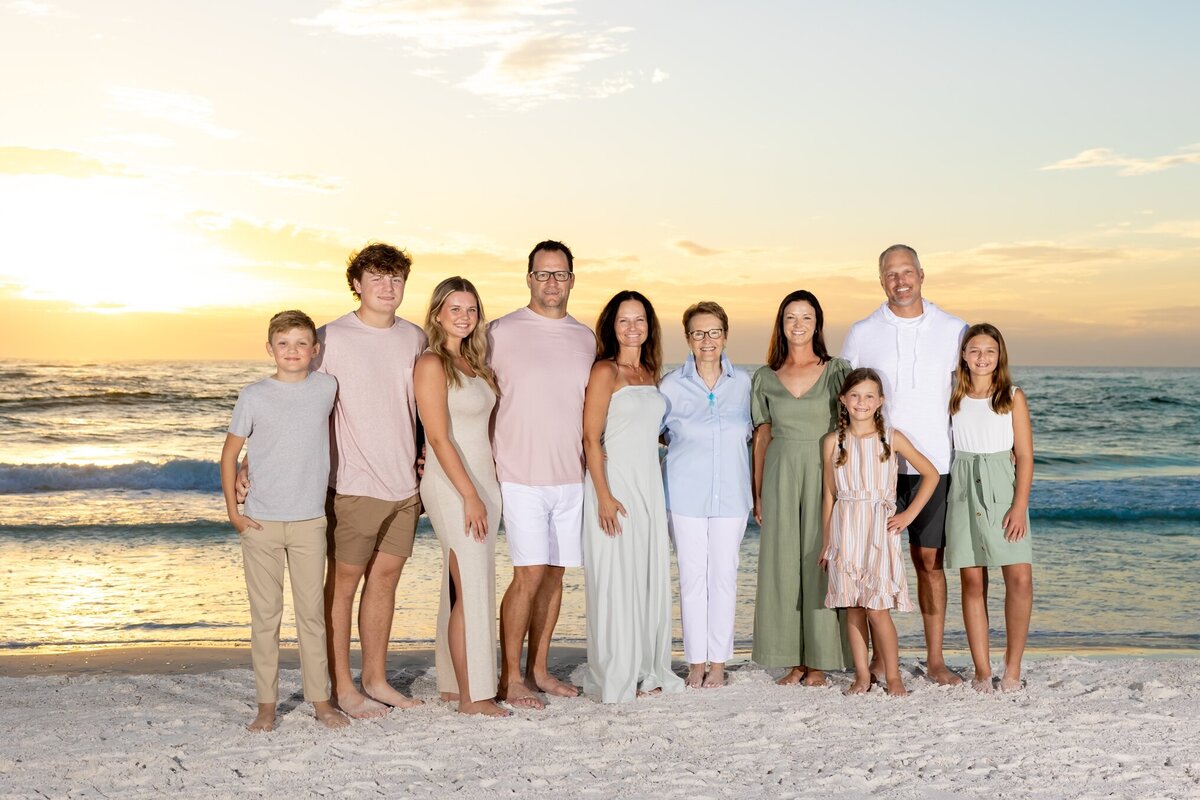 Extended family portrait on the beach at sunse