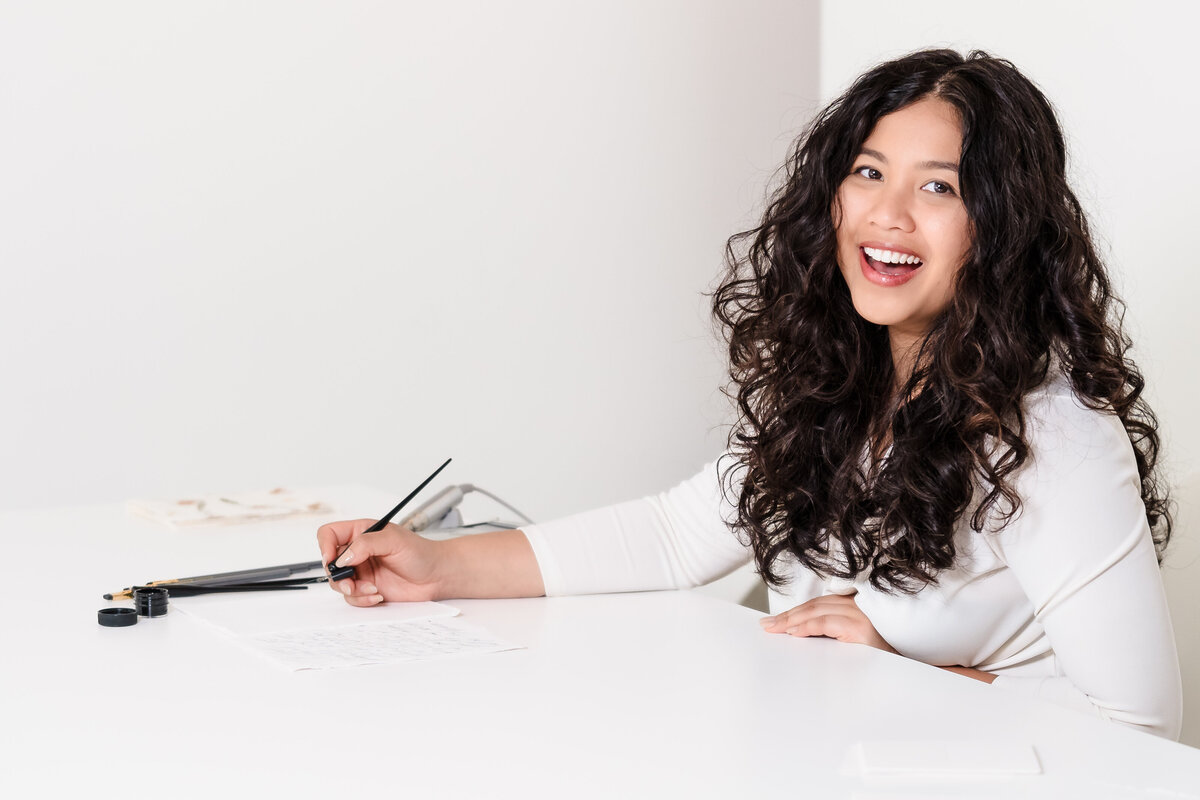 brand photo of a calligrapher in action