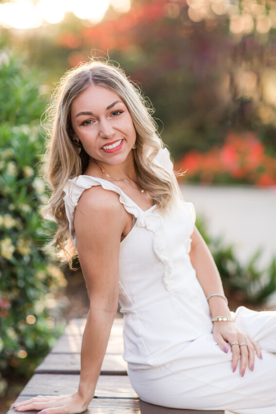 San Diego State senior sitting on bench