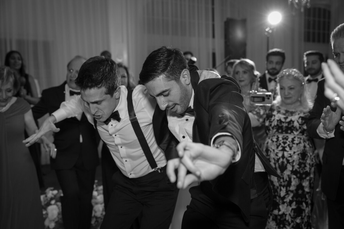 Guests enjoy the dance floor during wedding at Belle Mer Newport.