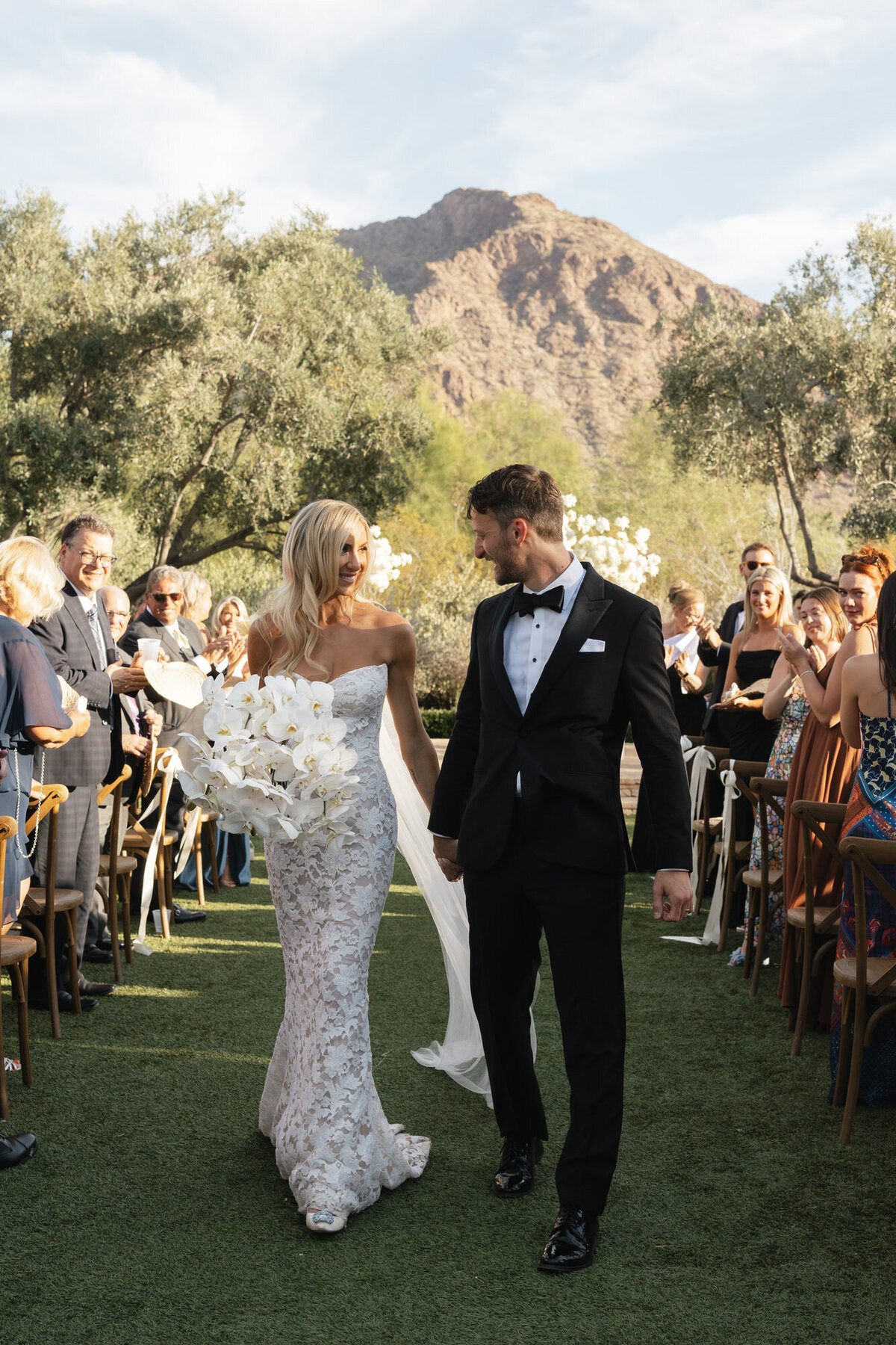 Bride and groom walking down aisle exiting ceremony at El Chorro