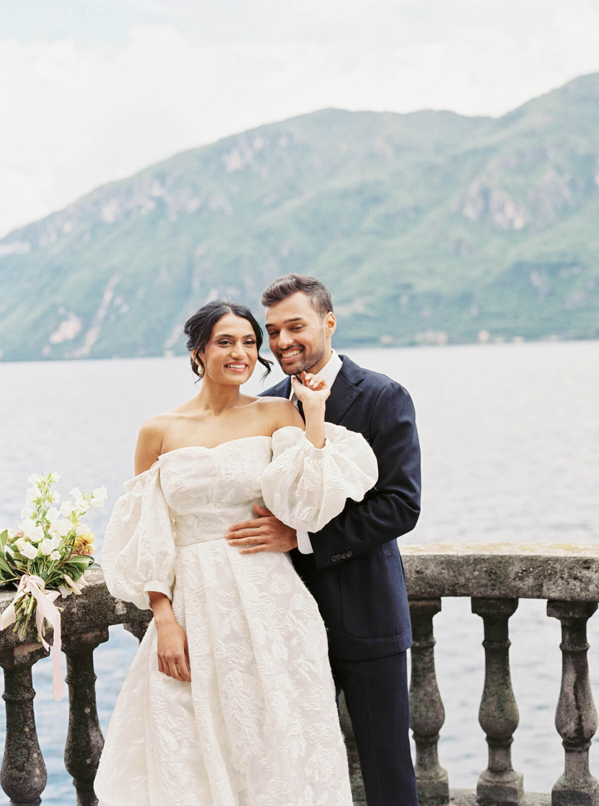 A wedding day photo of the bride and groom at Villa Aura del Lago on Lake Como in Italy