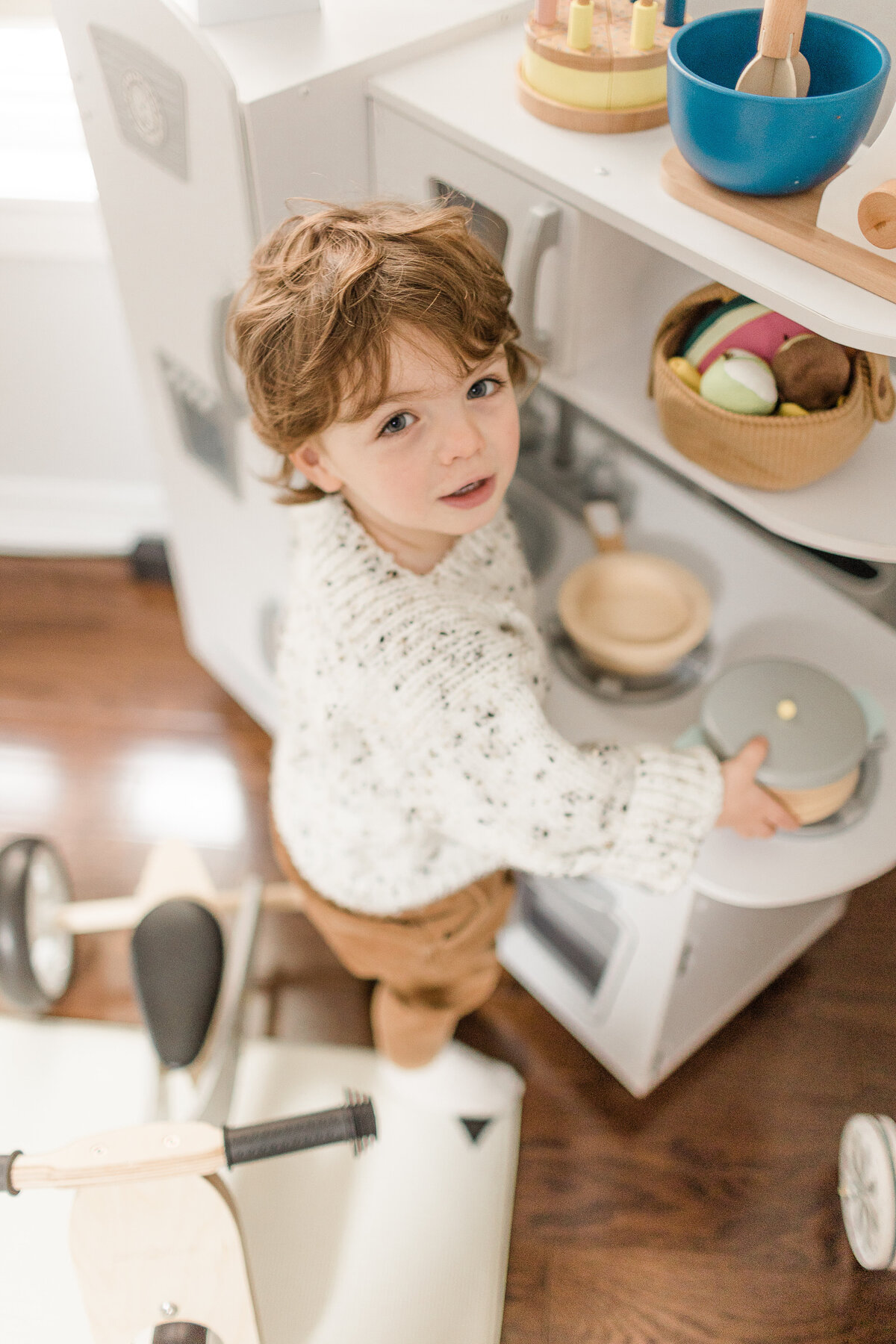 little boy playing at home family photos toronto ont