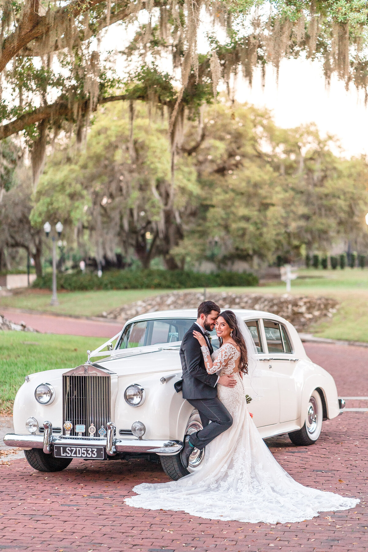 Wedding photography and videography in Orlando with a vintage car