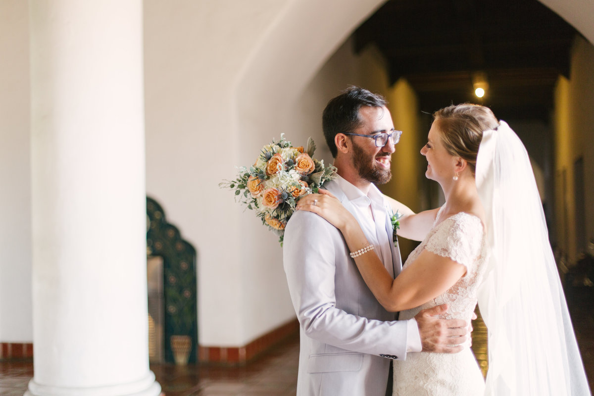 Bride and groom share a moment after Santa Barbara Courthouse wedding