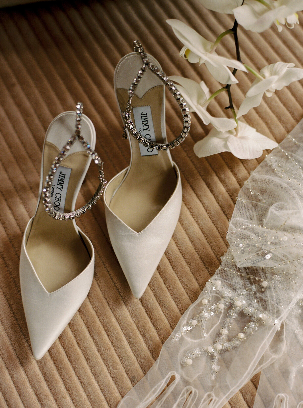 Jimmy Choo shoes and some beautiful gloves for the bride and her destination wedding