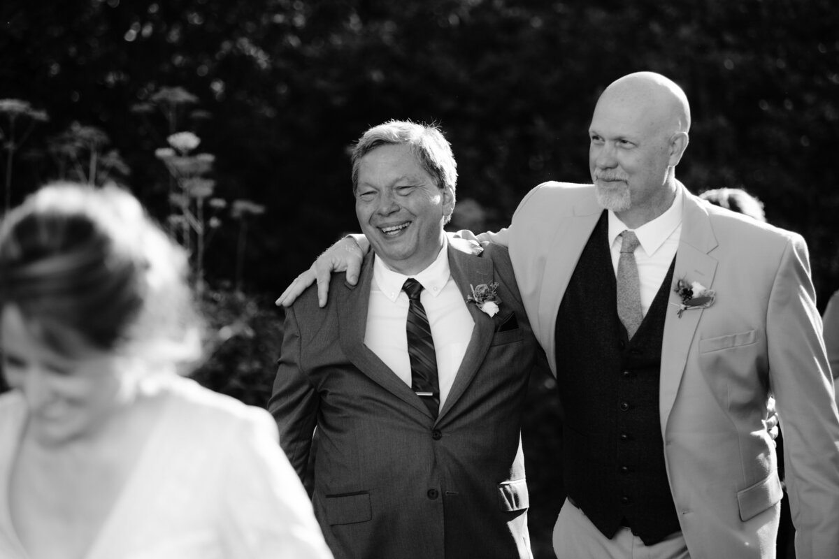 castine-wedding-ceremony-fathers-laughing