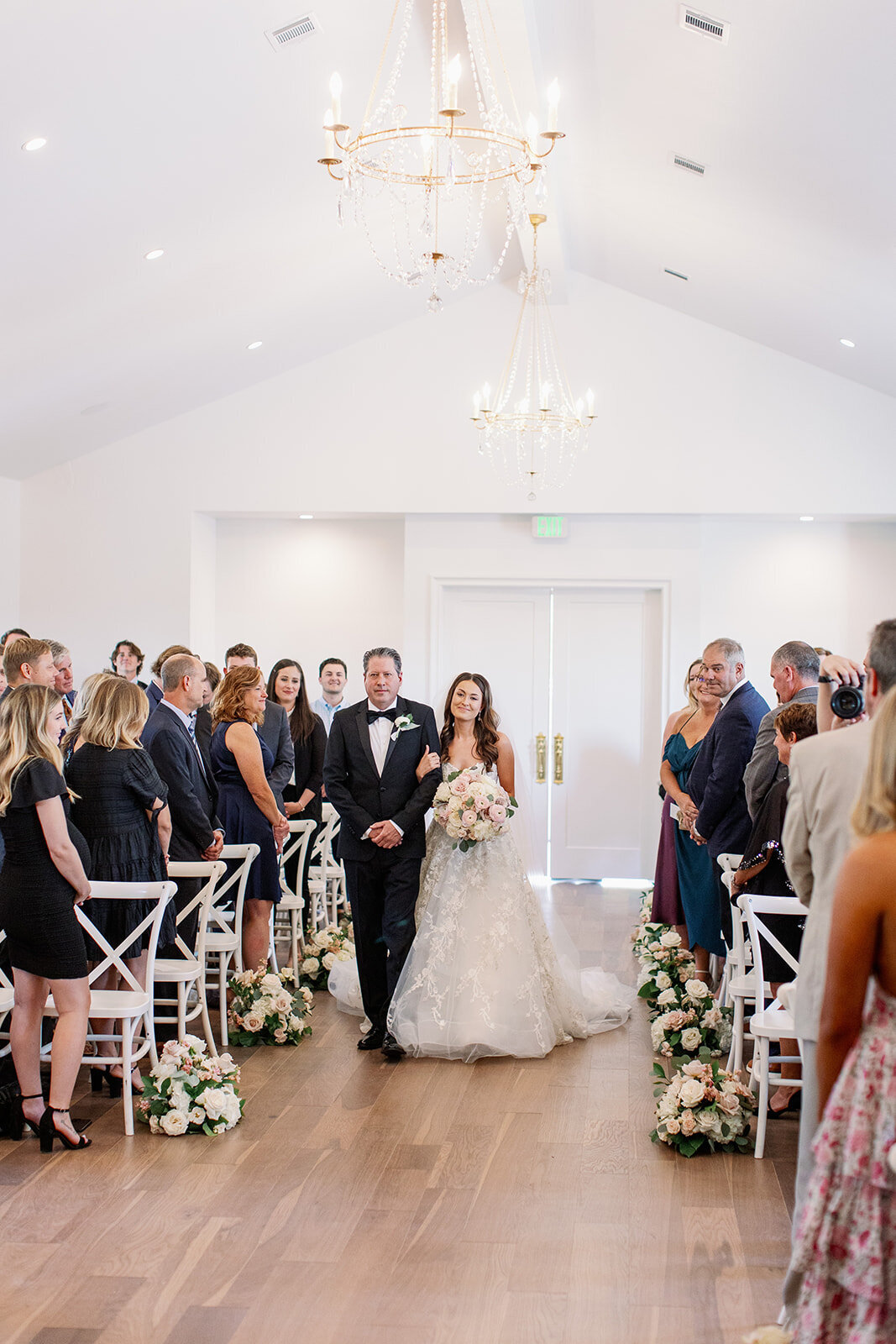 bride walking down aisle at the Nest wedding chapel