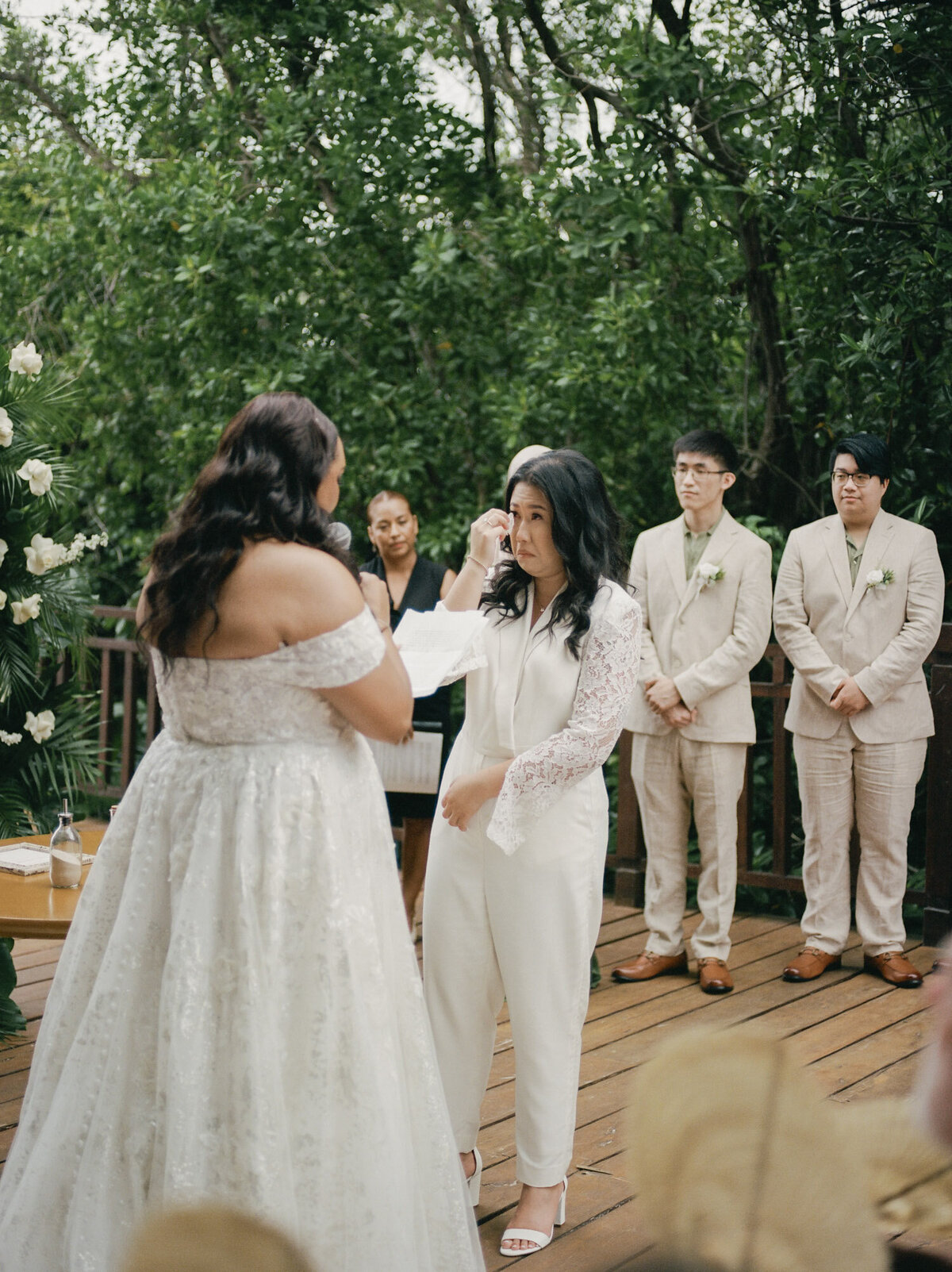 bride in chic pantsuit cries, emotional wedding ceremony, Mexico destination wedding