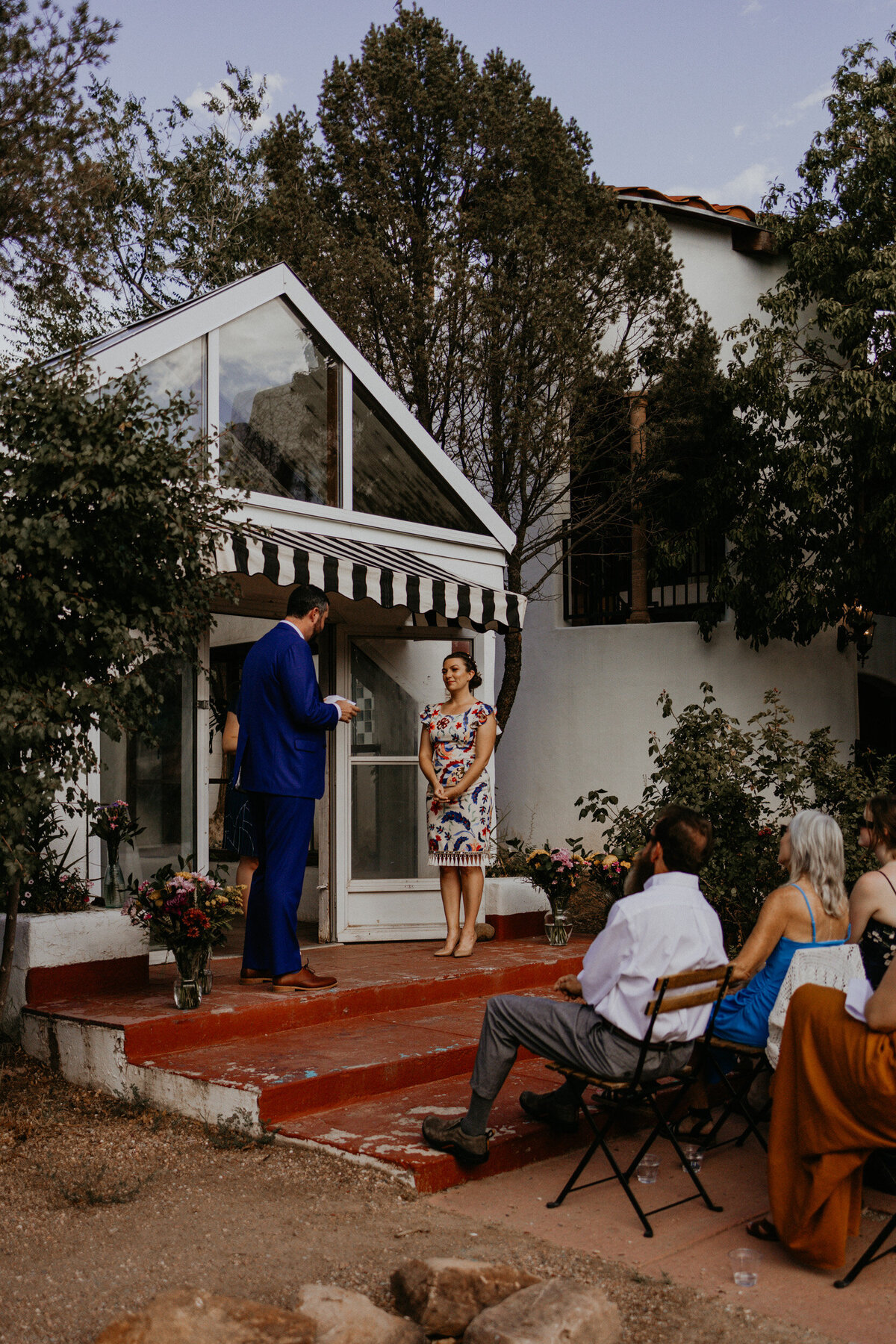 a bride and groom during  their intimate wedding at El Rey Court in Santa Fe, New Mexico