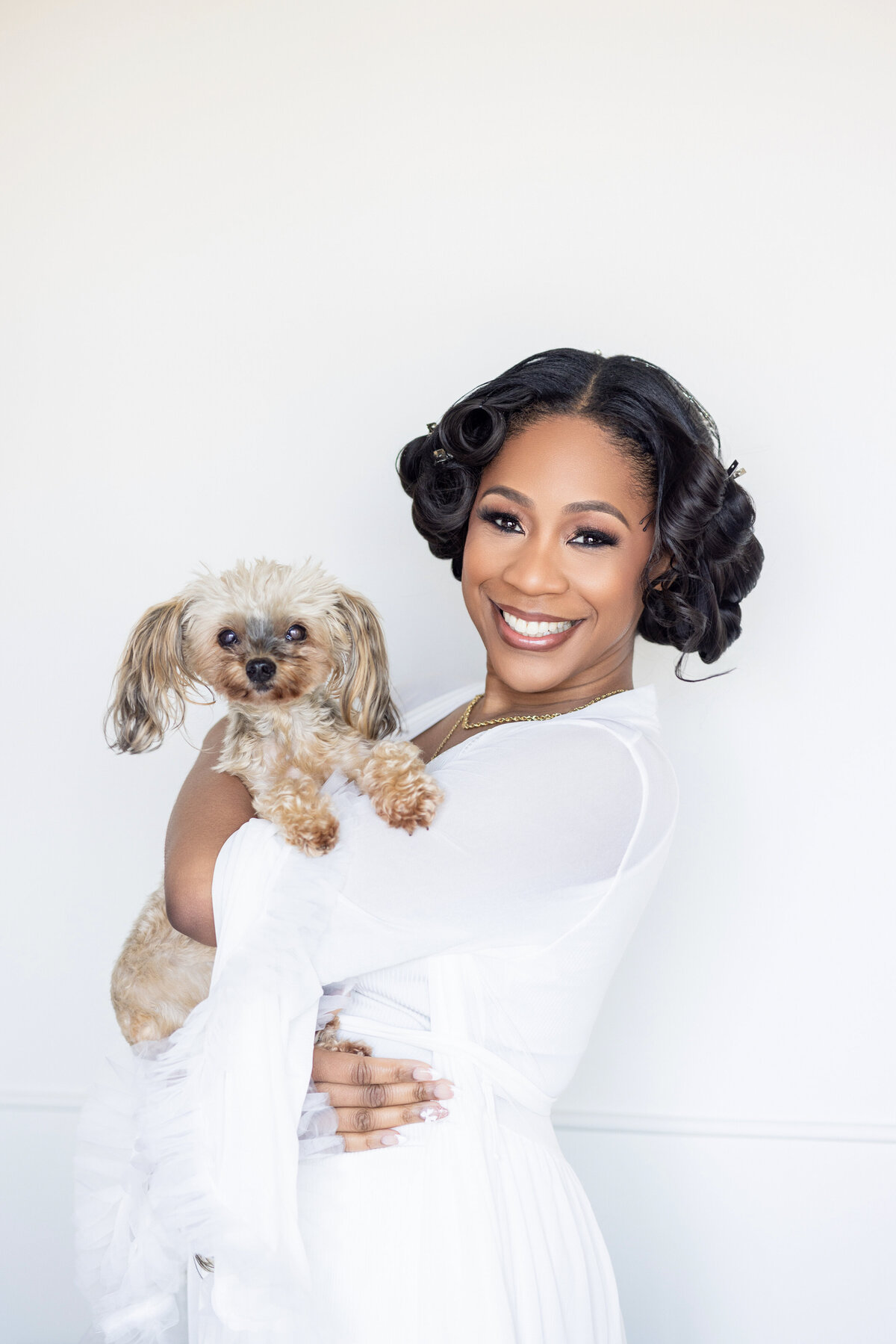 Bride holding her dog