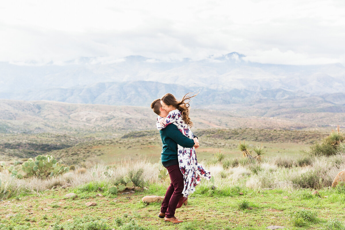 engaged couple hugging each other