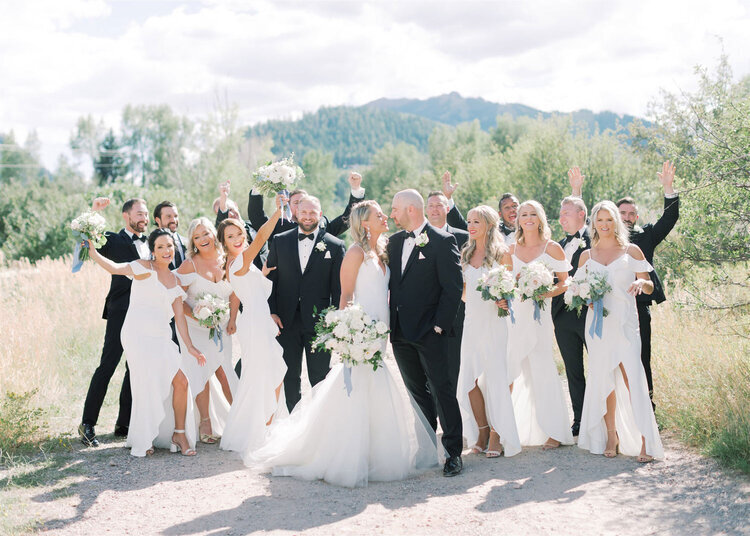 Bridal party with a mountain backdrop