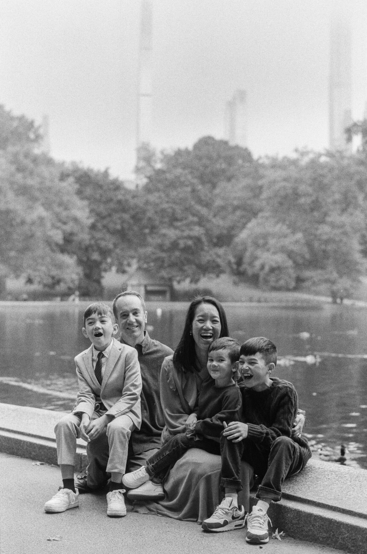 Kim-Trang sits in a NYC park with her partner and three songs
