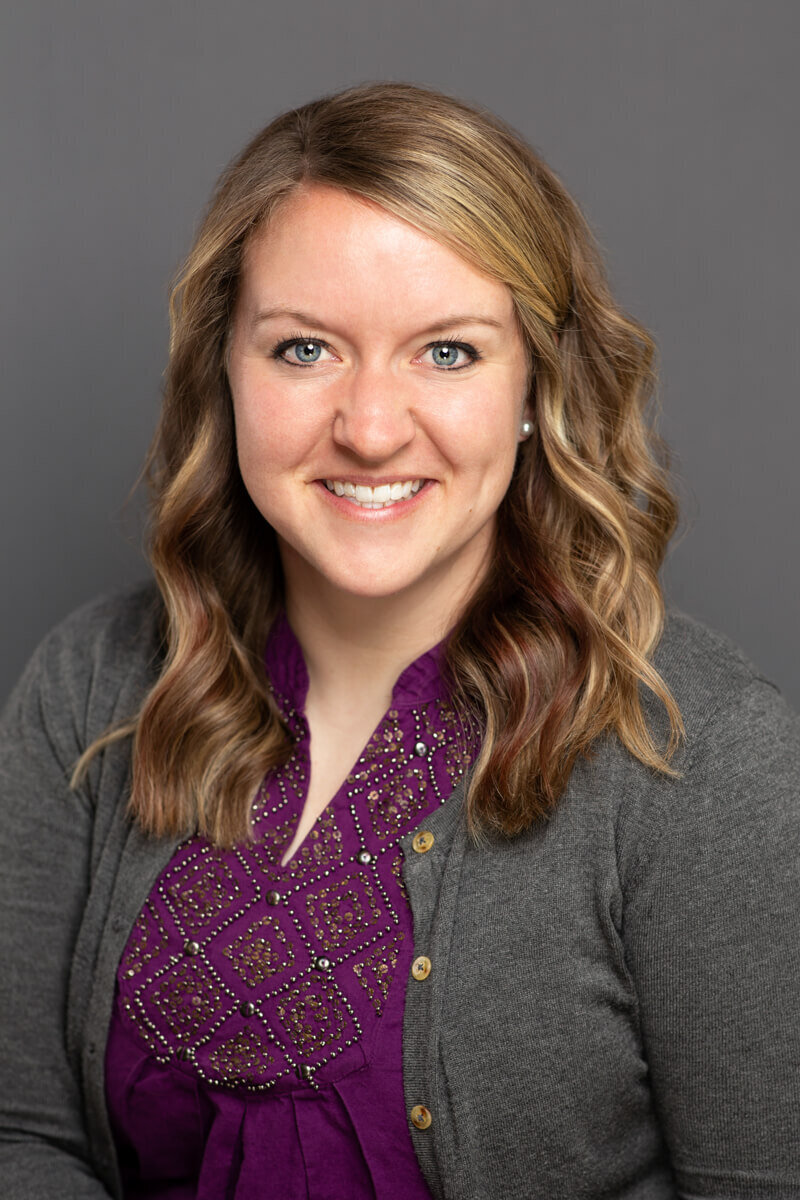 Team headshot taken on gray background in Utah by Sara Vaz Photography.