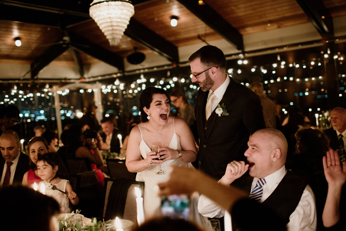 A moody reception candid captured by Fort Worth Wedding Photographer, Megan Christine Studio