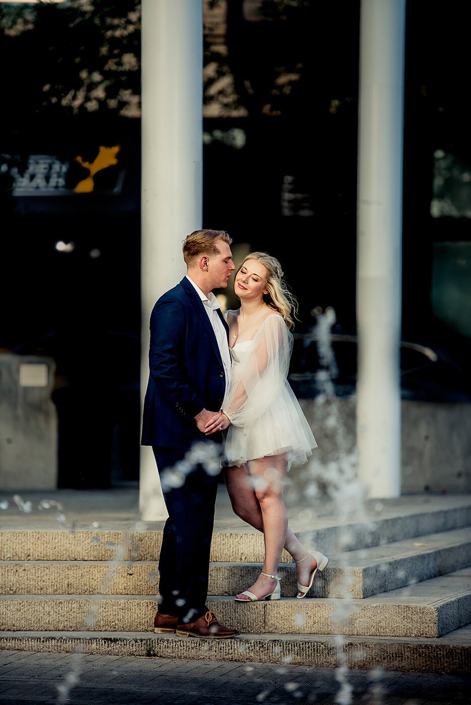 couple by fountain