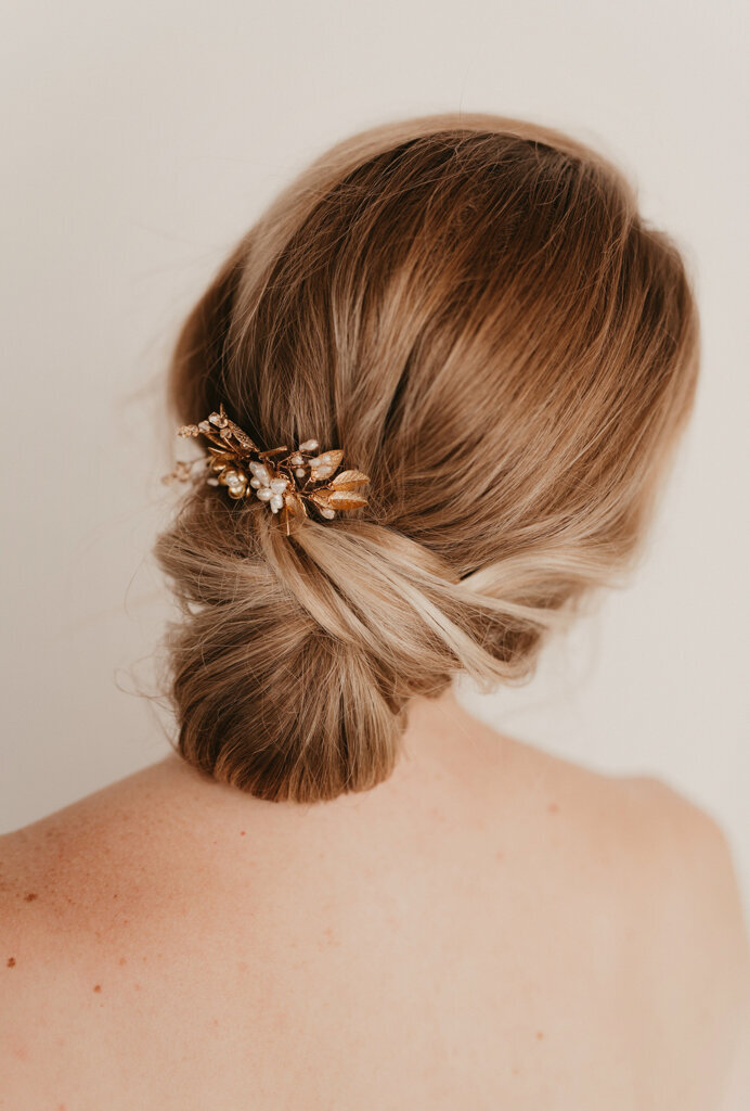 Romantic and elegant bridal hairstyle by Veil Beauty Co, Edmonton hair & makeup artist, featured on the Brontë Bride Vendor Guide.