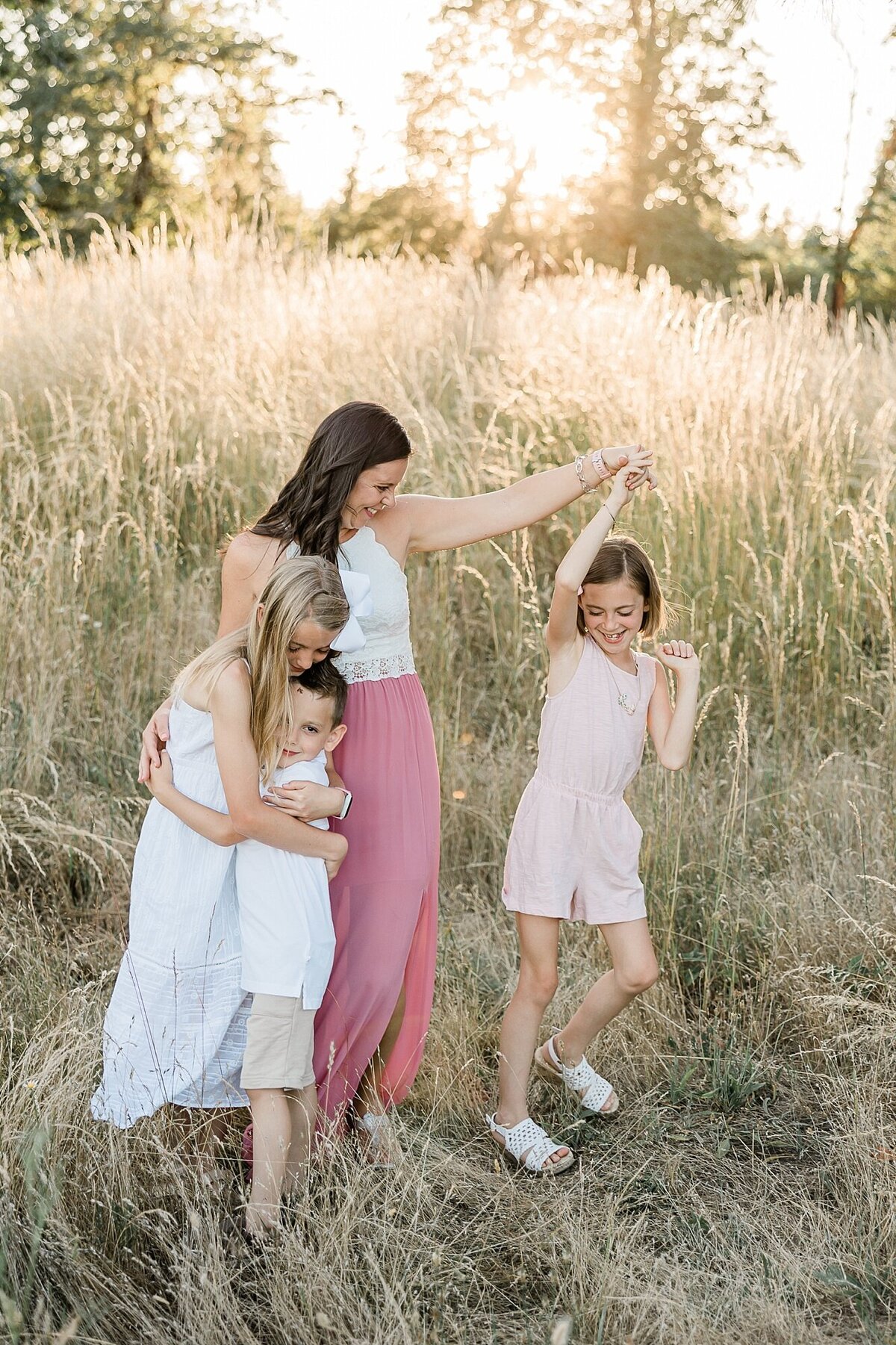 Hillsboro Family spinning little girl in family photo