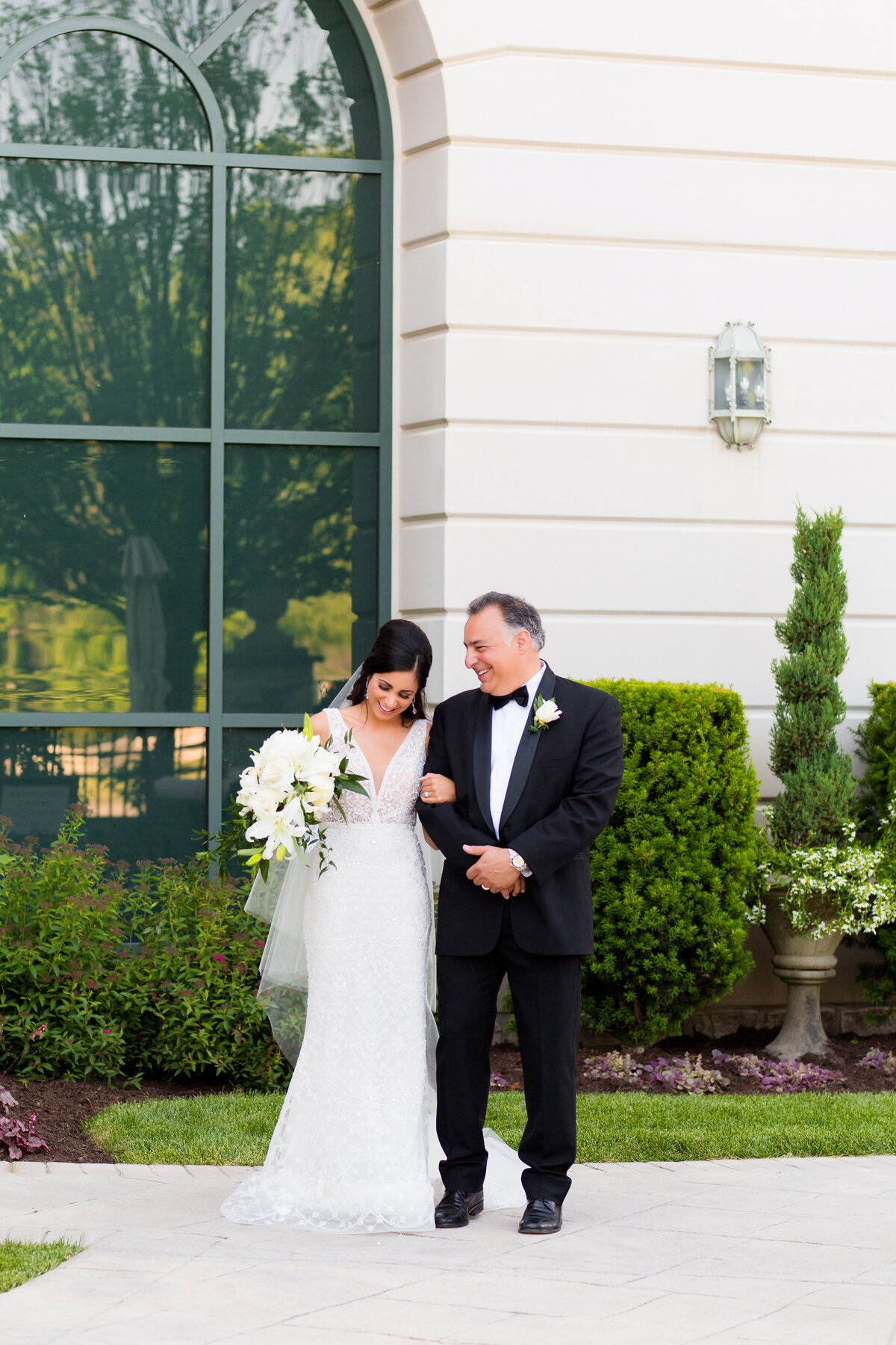 nemacolin resort wedding photographers candid moment of bride and dad