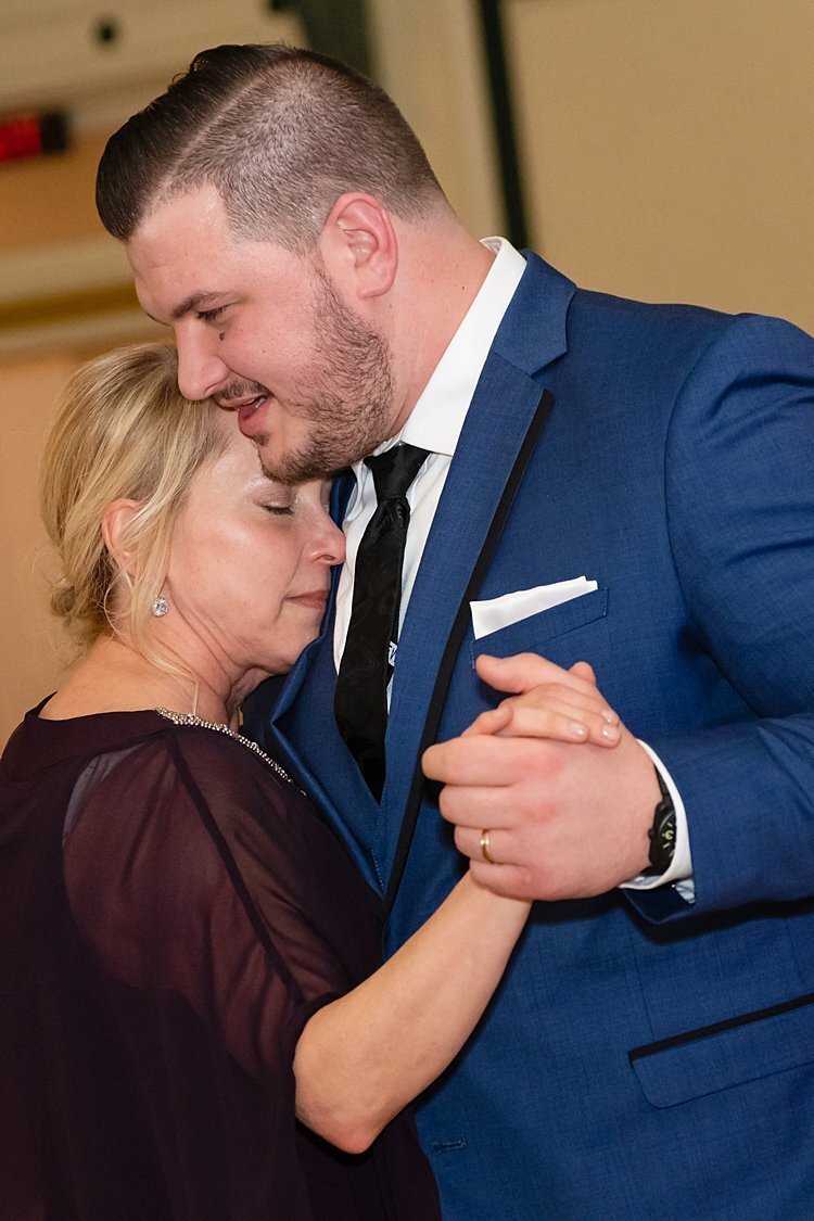 NFL free agent Groom dances with his Mom during his wedding reception at Soldiers and Sailors Memorial Hall in Pittsburgh, PA