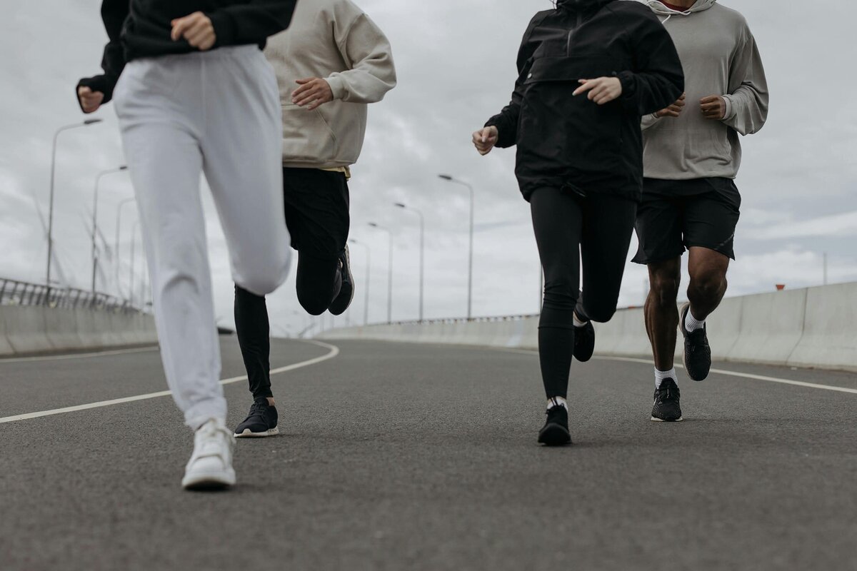Runners group running on a road