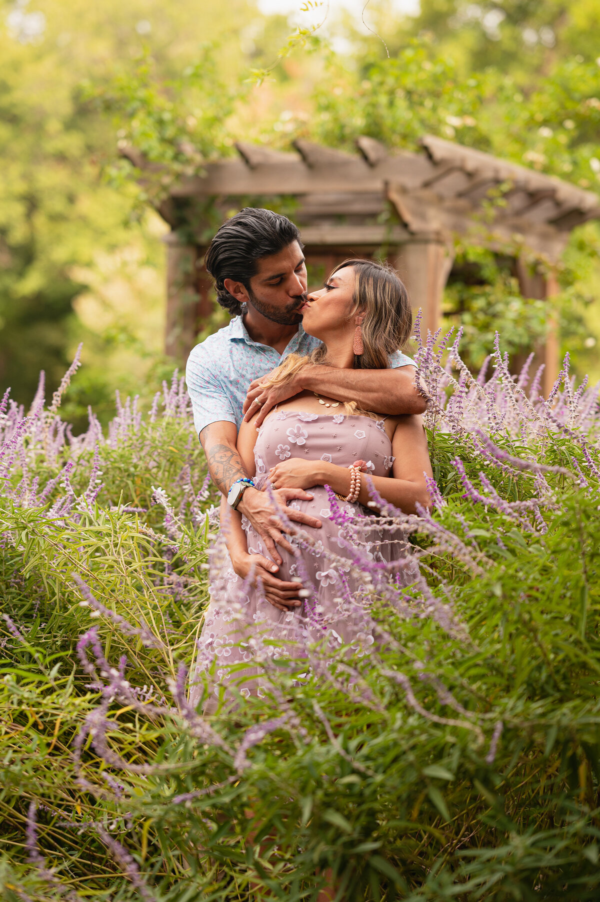 Mother and daughter embracing in a field of wildflowers — tender Weatherford family photography by Poppy + Blue Photography